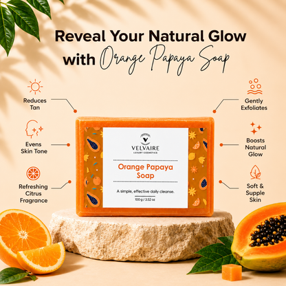 Velvaire Orange Papaya Soap bar displaying top benefits: reduces tan, gently exfoliates, boosts natural glow, and evens skin tone.